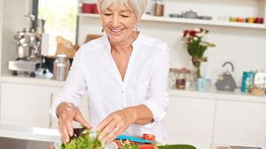 Older woman eating healthy food