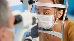 A patient gets an eye exam