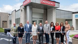 Rochester Regional Health leaders cut a ceremonial ribbon outside the Clifton Springs Hospital and Clinic Emergency Department