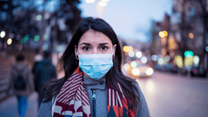 Pandemic vs. Epidemic. Woman wearing mask.